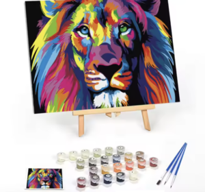 An easel with paints and a Colorful Lion - Paint by Numbers kit canvas on it