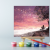An easel with a Pink Sunset paint by number canvas on it