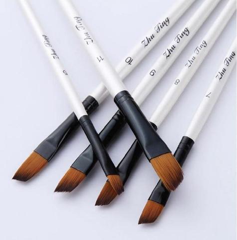 set-of-white-paintbrushes