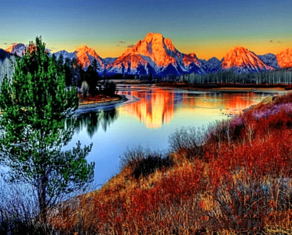 The Grand Teton mountains are reflected in the water painting